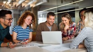 Digital marketing team planning strategy at Paid Ads agency